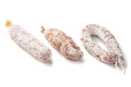 Three kinds of Air dried pork sausage , smoked meat, close-up, isolated on white background.の写真素材