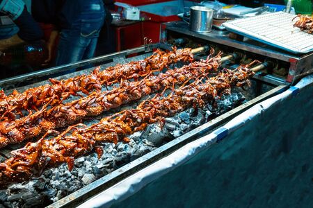 Thai street food in Bangkok, delicious roast chicken BBQの写真素材