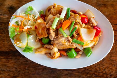 Thai food Pad Thai, Stir fry pork  in white plate. The one of Thailand's national main dish. the popular food in Thailand. Thai Fried Porkの写真素材