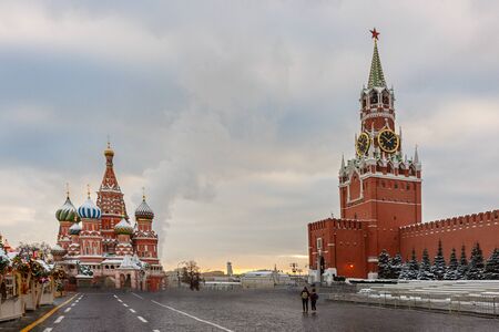 Moscow Kremlin and of St Basil's Cathedral on Red Square, Moscow, Russia. Ancient Moscow Kremlin is the main tourist attraction of city. Beautiful panoramic view of the heart of Moscow on winter cloudy day.の写真素材