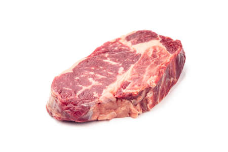 Close-up raw rib eye steak isolated on white background with clipping path.の写真素材