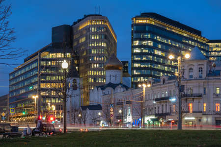 View of Temple of St. Nicholas in Tverskaya Zastava (built in the years 1914-1921) between the two office center buildings, which are located on a White Square. Dusk timeの写真素材