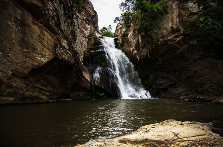 Chattrakan Waterfall in Thailand water fall in deep forest at border of Phitsanulok province Thailand .の写真素材