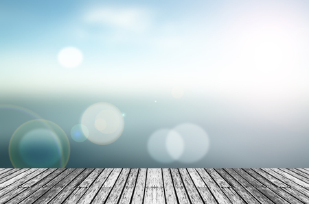 Wood, blue sea and sky backgroundの写真素材