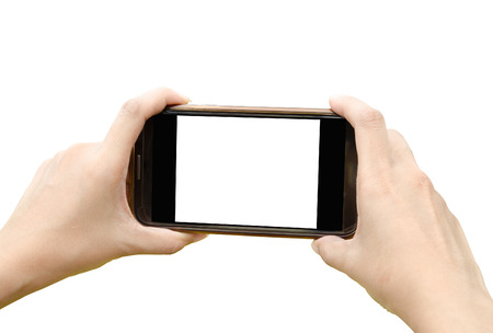 Hand holding smart phoneの写真素材