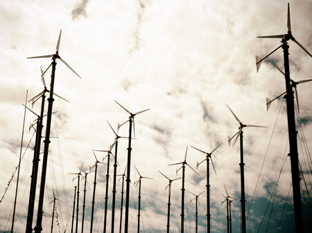silhouette of wind turbine retro style processの写真素材