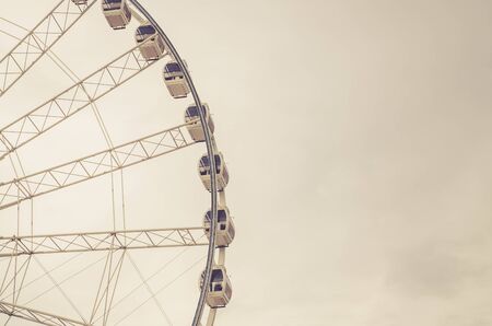 vintage Ferris wheel with sky process in retro styledの写真素材