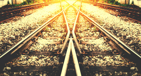 train rail way with sunlight background process on vintageの写真素材