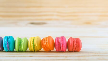 French macaroons on sack with wood background on filter colorの写真素材