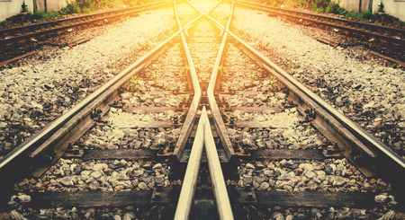 train railway with sunlight background process on vintageの写真素材