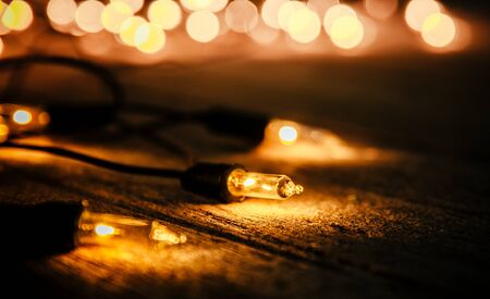 christmas light decor on wood backgroundの写真素材
