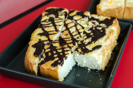 toast butter with chocolate topping , selective focusの写真素材