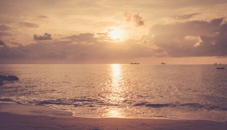 beautiful sunset in morring sea beach , vintage styled toneの写真素材