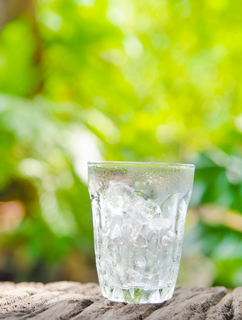 water on table  with nature backgroundの写真素材