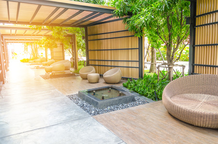 Rattan Sofa In The Garden process with sunlight の写真素材