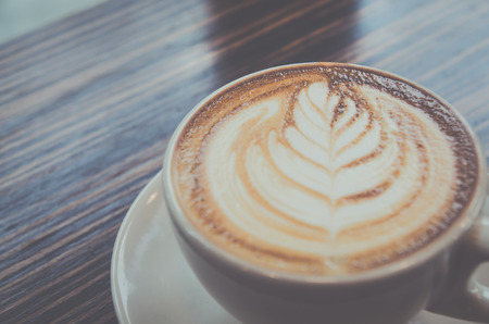 Cup of coffee with beautiful Latte artの写真素材