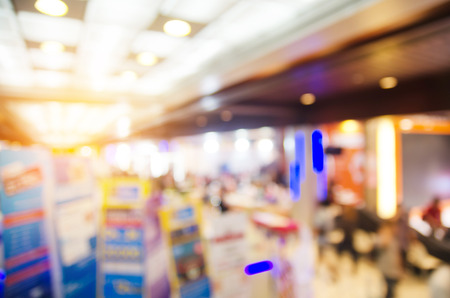 Abstract blur people in exhibition hall event backgroundの写真素材
