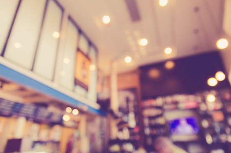 Blurred background made with Vintage Tones,Coffee shop blur background with bokehの写真素材