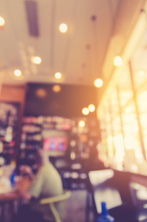 Blurred background made with Vintage Tones,Coffee shop blur background with bokehの写真素材