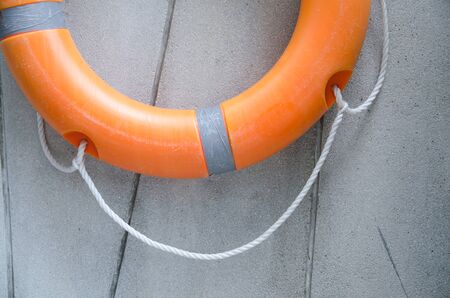 Orange lifebuoy,All Water rescue emergency equipment.の写真素材