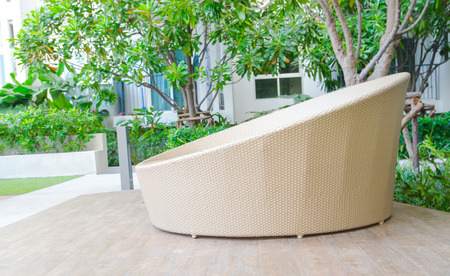 Rattan Sofa In The Garden process with sunlight , pulbic area for peopleの写真素材