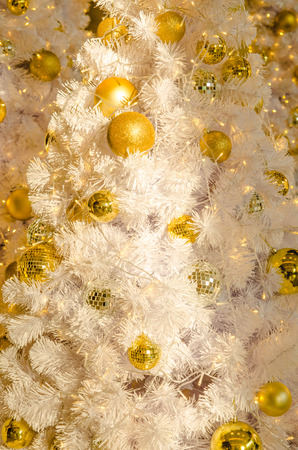 Decorative christmas background , christmas bell on white treeの写真素材