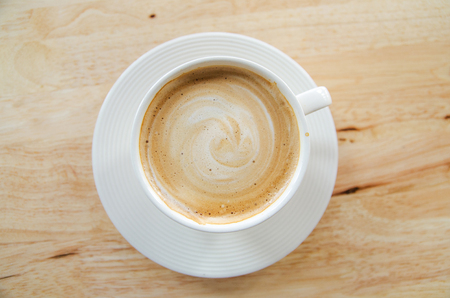 cup of coffee on table in cafeの写真素材
