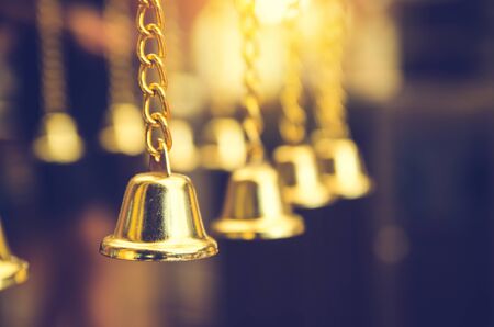 Jingle bell and Christmas tree branchesの写真素材