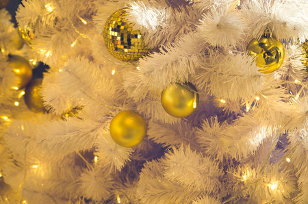 Decorative christmas background , christmas bell on white treeの写真素材