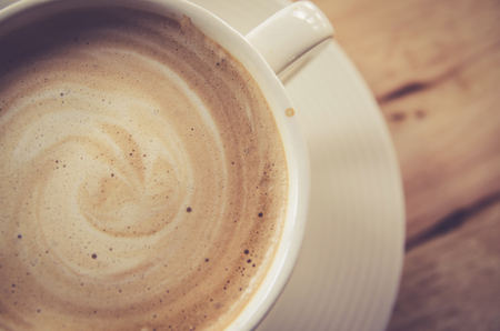 cup of coffee on table in cafeの写真素材