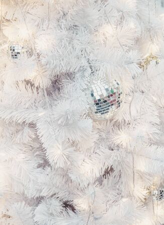 white christmas tree with ball ornament decoration on tree , copyspace for banner text or greetingの写真素材