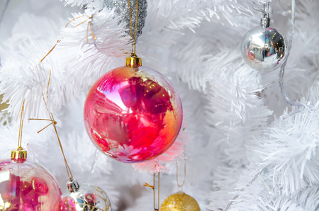 white christmas tree with ball ornament decoration on tree , copyspace for banner text or greetingの写真素材