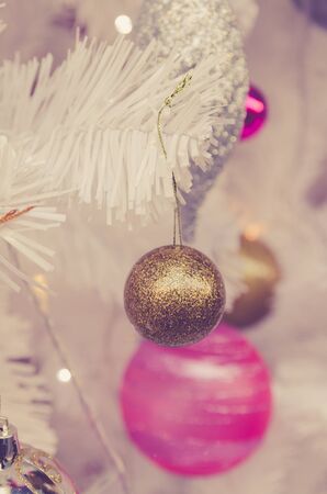 white christmas tree with ball ornament decoration on tree , copyspace for banner text or greetingの写真素材