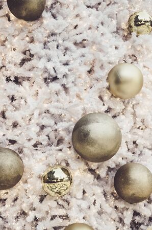 white christmas tree with golden ball ornament decoration on tree , copyspace for banner text or greetingの写真素材