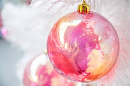 white christmas tree with ball ornament decoration on tree , copyspace for banner text or greetingの写真素材
