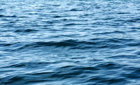 Blue Tones Water Waves Surface as Backgroundの写真素材