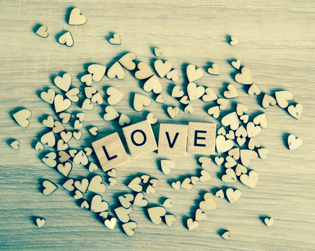 LOVE word written on wood block ,valentine backgroundの写真素材