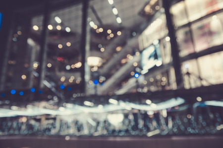 Abstract blur people in exhibition hall event backgroundの写真素材