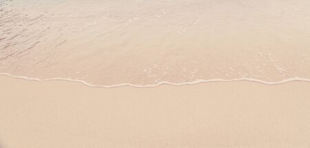 Soft wave of the sea on the sandy beachの写真素材