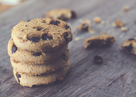 Chocolate chip cookies on old wooden tableの写真素材
