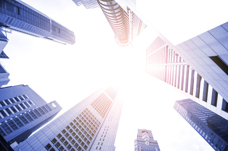 Modern business skyscrapers, high-rise buildings, architecture raising to the sky, sun. Concepts of financial, economics, future etc.の写真素材