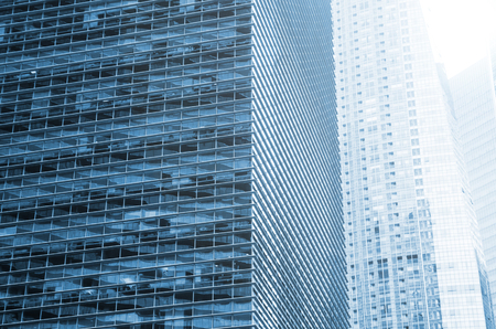 Modern business skyscrapers, high-rise buildings, architecture raising to the sky, sun. Concepts of financial, economics, future etc.の写真素材