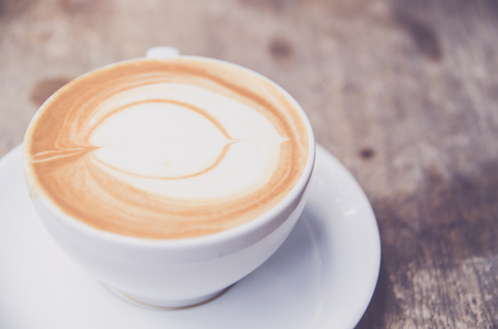 Cup of coffee with beautiful Latte artの写真素材