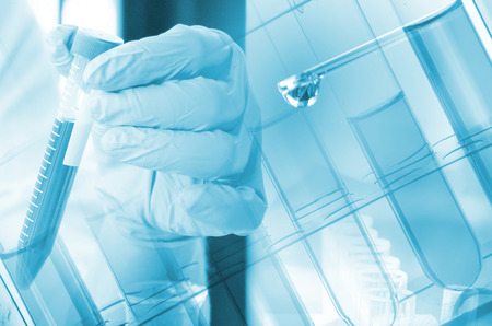 Vacutainer or test tube in lab on tableの写真素材