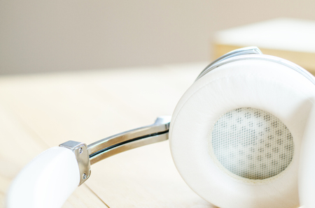 headphones  on wooden tableの写真素材