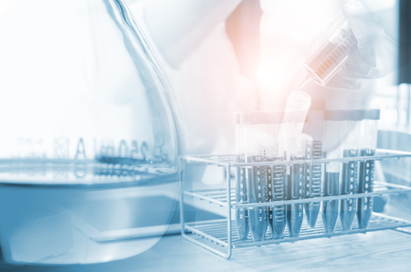 Vacutainer or test tube in lab on tableの写真素材