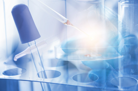 Vacutainer or test tube in lab on tableの写真素材