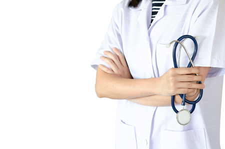 Medical physician doctor woman over blue clinic background.の写真素材