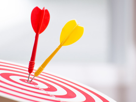 target dart pin on center 10 point dartboard  Marketing concept.の写真素材