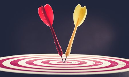 target dart pin on center 10 point dartboard  Marketing concept.の写真素材